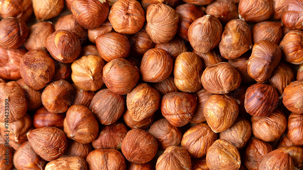 Background of hazelnuts. Full frame of peeled organic hazelnuts Background of hazelnuts. Full frame of peeled organic hazelnuts