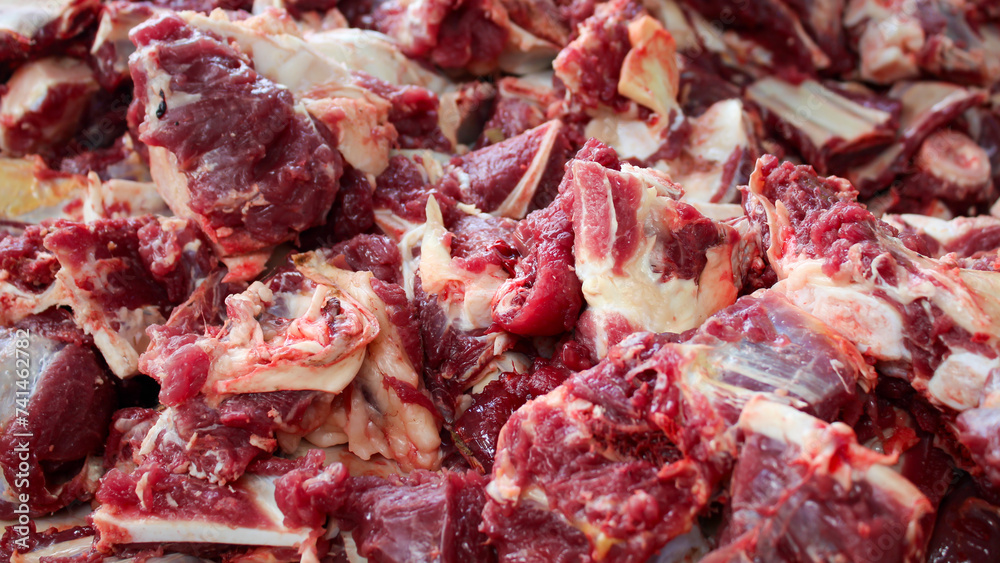 Piles of cow and lamb meat from halal slaughtering during Eid Al-Adha. The Feast of Sacrifice or Idul Qurban.