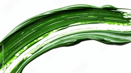 Vibrant green paintbrush stroke isolated on white background for artistic design projects