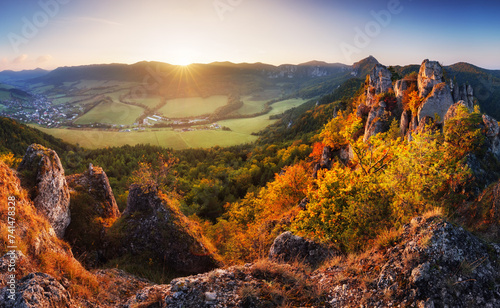 Scenic view of autumn mountain landscape with foggy valley. The Sulov Rocks, national nature reserve in northwest of Slovakia, Europe.