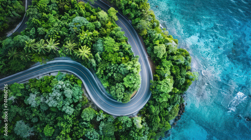 Aerial view of curve road along the seashore at Phuket Thailand beautiful seacoast and open sea in summer season Nature recovered Environment and Travel background.
