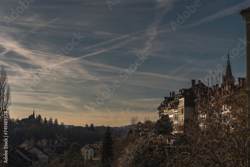 Panoramic view over Bern from Nydegg bridge with cloudy sky