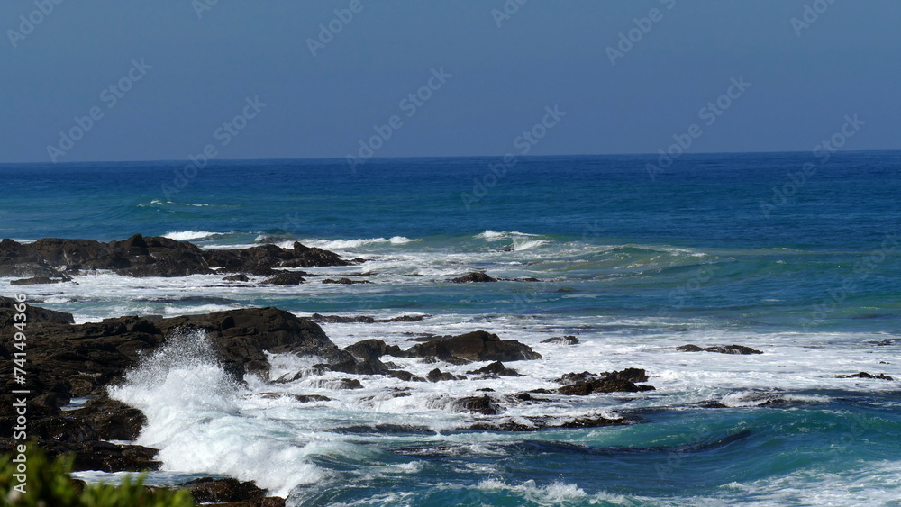 waves crashing on the rocks