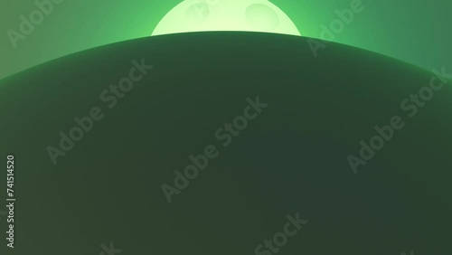 Full moon for Halloween wallpaper green background with copy space and disolve into dark. Beautiful mysterious footage in 4k resolution for a greeting or presentation. photo