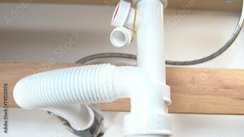 Fastening under the sink in the kitchen.