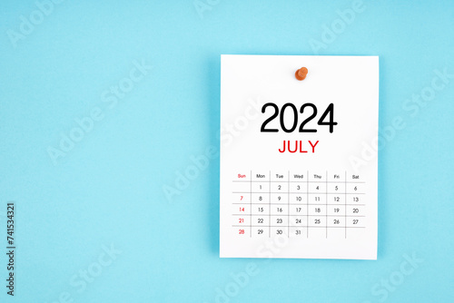 July 2024 calendar page with push pin on blue background.