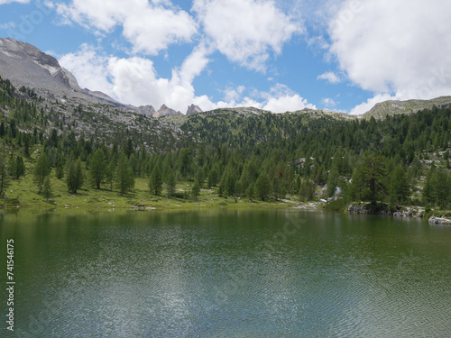 Fototapeta Naklejka Na Ścianę i Meble -  Le Vert Lake near the Lavarella Hut in the Greenery of the Fanes - Sennes - Braies Nature Park, Alpi Mountains, Italy
