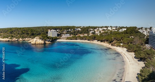 view of the beautiful sandy beach and seaside resort of Cala Galdana on Menorca island in Spain photo