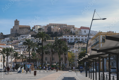 Romantic backstreet, side street and alleys in historic old town of Ibiza Stadt, Balearic Island with historic Mediterranean style architecture facades, a landmark sightseeing tourist spot in downtown photo