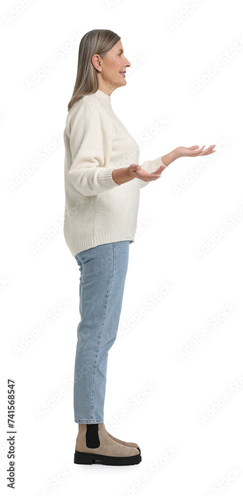 Full length portrait of senior woman on white background