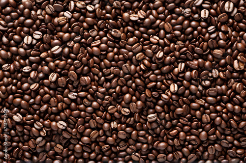 Roasted coffee beans background  texture with copy space