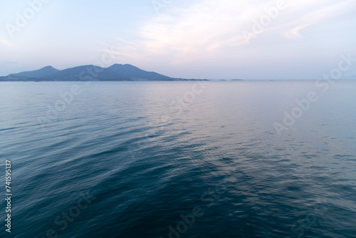 View of the calm sea surrounded by islands
