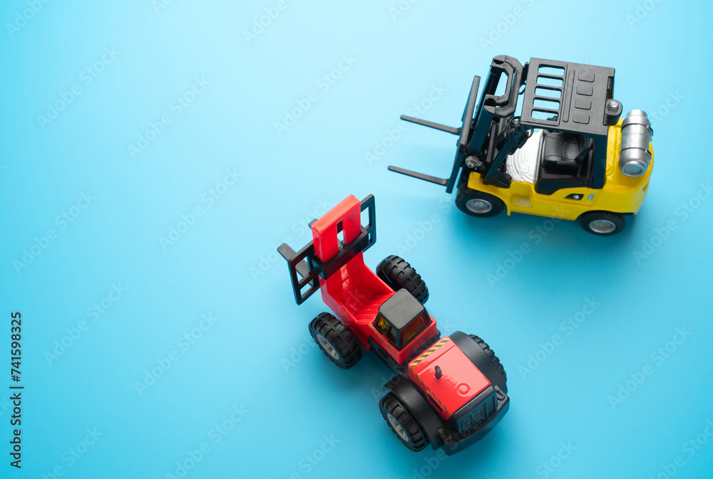 Forklifts and place for text. Efficient logistics and distribution systems. Warehouses, manufacturing facilities, and distribution centers. Forklifts and place for text. Efficient logistics and distribution systems. Warehouses, manufacturing facilities, and distribution centers.