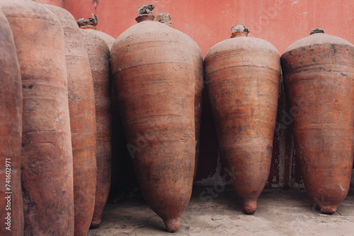 Ceramic barrels for wine and pisco production in the distillery, in Ica, Peru. photo
