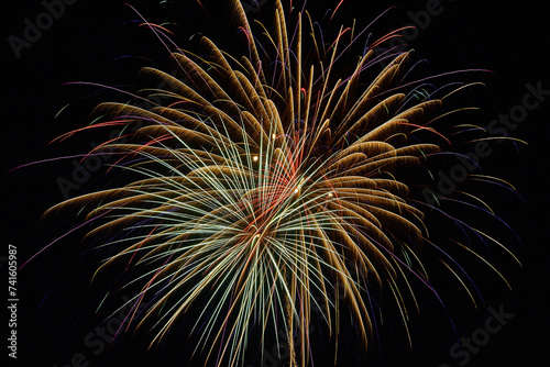 Vibrant Fireworks Display at Night, Carnival Celebration, Ground View photo