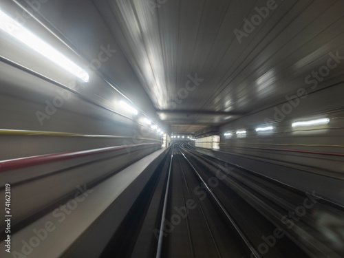 fast moving subway tunnel metro train with blurred motion