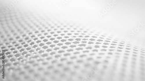 Abstract White Fabric with Perforations - Close-up of Textured Material with Dot Pattern for Modern Design Concepts background photo