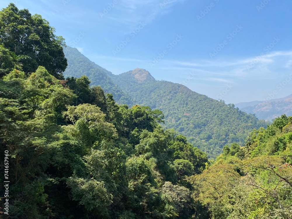 Green forests and mountains of the Western Ghats around Subrahmanya Road in Karnataka in South India. Green forests and mountains of the Western Ghats around Subrahmanya Road in Karnataka in South India.