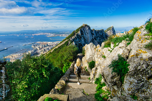 Girl hiking on mountain path in Gibraltar photo
