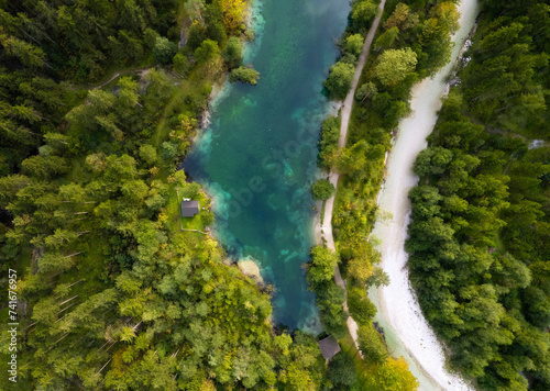 Aerial drone top view of emerald blue lake Bluntausee, Golling an der Salzach, Salzburg, Austria. photo
