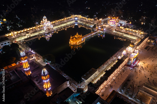 Aerial view of the Sri Harmandir Sahib, a Sikh pilgrimage site in Katra Ahluwalia, Amritsar, Punjab, India. photo