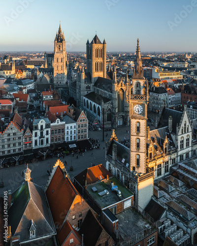Aerial view of Sint Niklaaskerk (Saint Nicholas' Church) and the Gildenhuis van de Vrije Schippers clock tower in Gent downtown, Ghent, East Flanders, Belgium. photo
