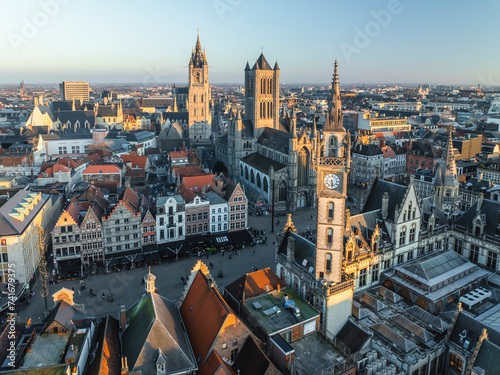 Aerial view of Sint Niklaaskerk (Saint Nicholas' Church) and the Gildenhuis van de Vrije Schippers clock tower in Gent downtown, Ghent, East Flanders, Belgium. photo