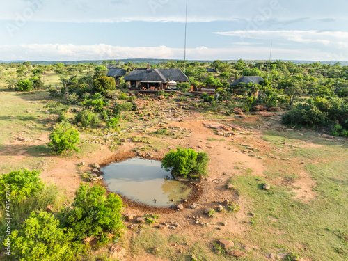 Aerial view of touristic houses with a small pond in the Savanna near Lephalale town, Limpopo region, South Africa. photo