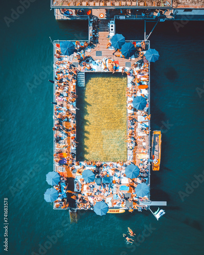 Aerial Drone view of the outdoor bathing facility Seebad Enge, Zurich in Switzerland. photo
