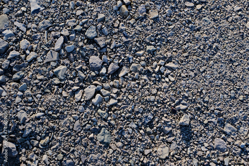 Fototapeta Naklejka Na Ścianę i Meble -  Dusty ground with small pebbles and stones