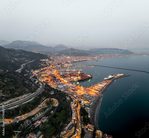 Aerial view of Salerno harbour and commercial port at sunset along the Amalfi Coast facing the Mediterranean Sea, Salerno, Campania, Italy. photo