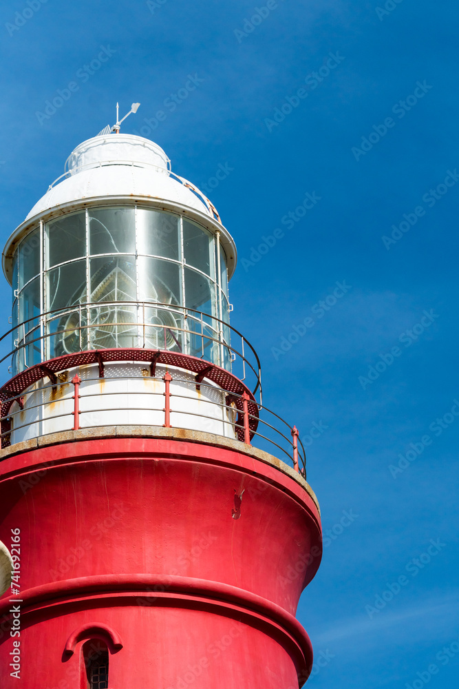 close up of the lantern at the top of a lighthouse concept technology for ocean or coastline safety in bad weather conditions