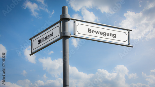 Фотография Signposts the direct way to Movement versus Standstill