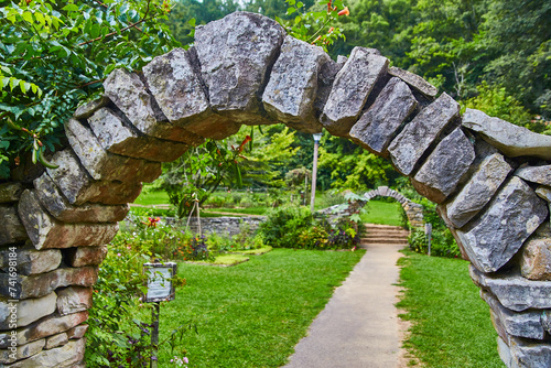 Принти на полотні Rustic Stone Archway in Lush Garden Path Perspective