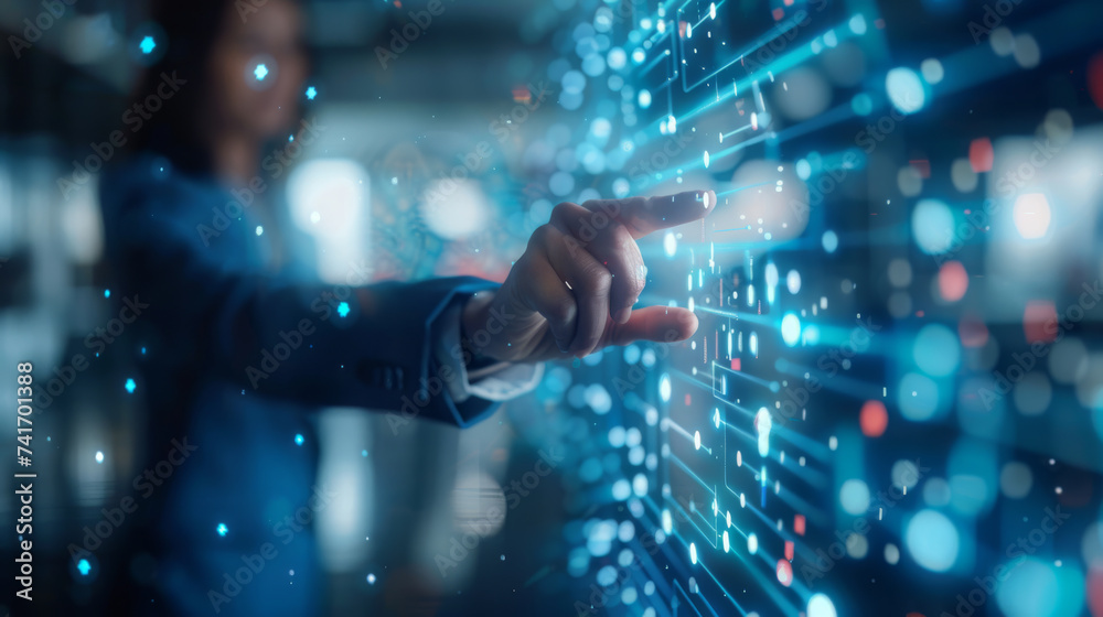 close-up of a businessman's hand interacting with a futuristic digital interface with glowing graphs and data analytics visualization. close-up of a businessman's hand interacting with a futuristic digital interface with glowing graphs and data analytics visualization.