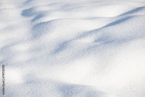 background of white snow under the sun