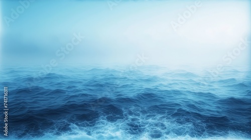 Deep blue sea surface with gentle waves and white foam © Adobe Contributor