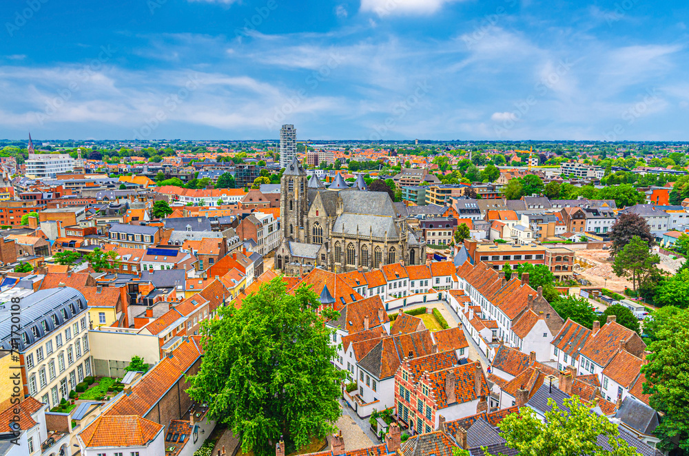 Obraz premium Aerial panoramic view of Kortrijk historical city centre with Roman Catholic Church of Our Lady, Courtrai Begijnhof and red tiled roof buildings, horizon amazing view, West Flanders province, Belgium