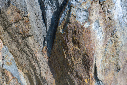 Stone pattern, granite rock surface, colored rock detail texture, rock structures, marble granite deposit.