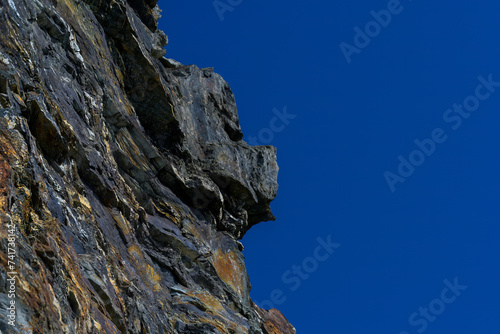 Stone pattern, granite rock surface, colored rock detail texture, rock structures, marble granite deposit.