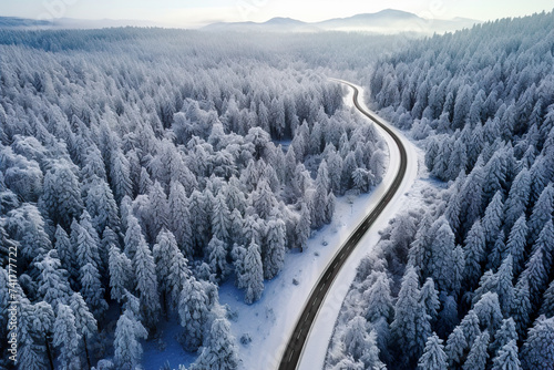 A Drone's Perspective of Snow-Laden Woodlands and Asphalt Trails . Generative AI © Philippe