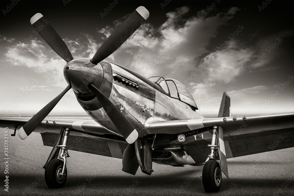historic fighter plane on an airfield