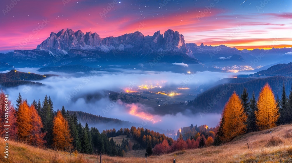 Scenic view of mountains and valley during sunset