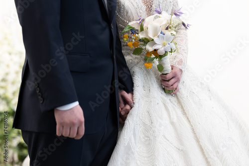 wedding dress, wedding rings, wedding bouquet