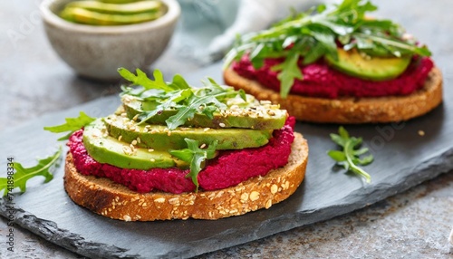 vegan sandwiches with beetroot hummus sandwich with beet cheese avocado and arugula