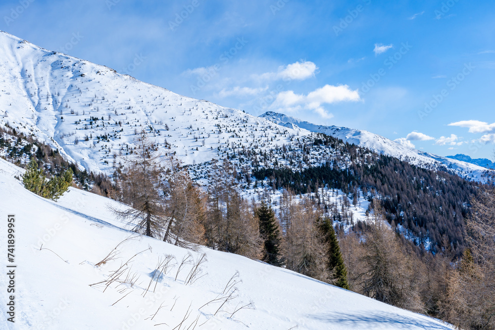 Winter landscape with snow covered Dolomites in Kronplatz, Italy