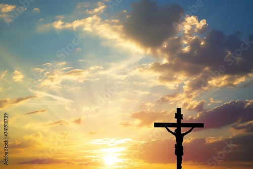 A cross on a hill with the sun in the background Easter greeting card with sunset sky