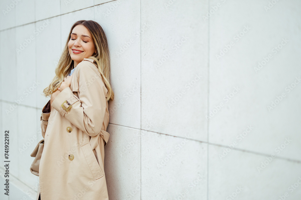 Portrait of a happy young woman enjoying her day outdoors. Portrait of a happy young woman enjoying her day outdoors.