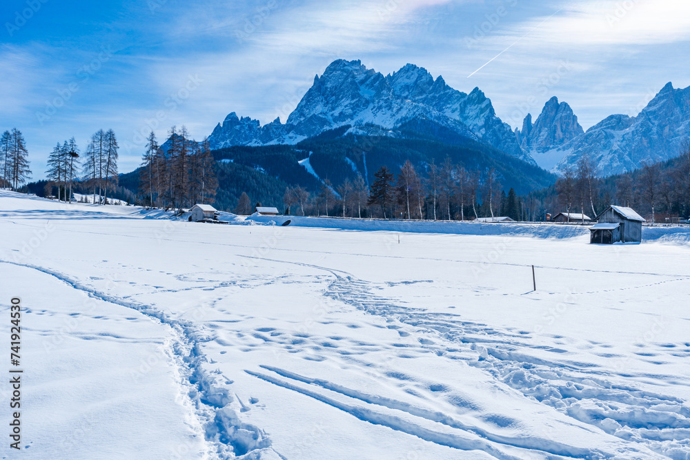 Winter landscape with snow covered Dolomites in Kronplatz, Italy