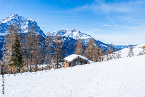Winter landscape with snow covered Dolomites in Kronplatz, Italy © beataaldridge
